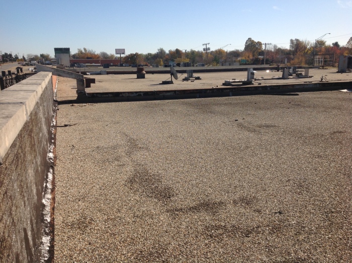 Durolast Metal Retrofit Roof System in Tulsa, OK - Before Image